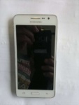 telefon Samsung SM-G531F zbity ekran, dotyk-cały, włacza sie jest obraz